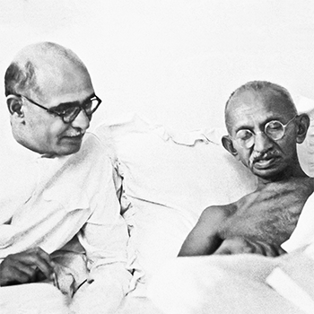 Mahadev Desai with Gandhi  